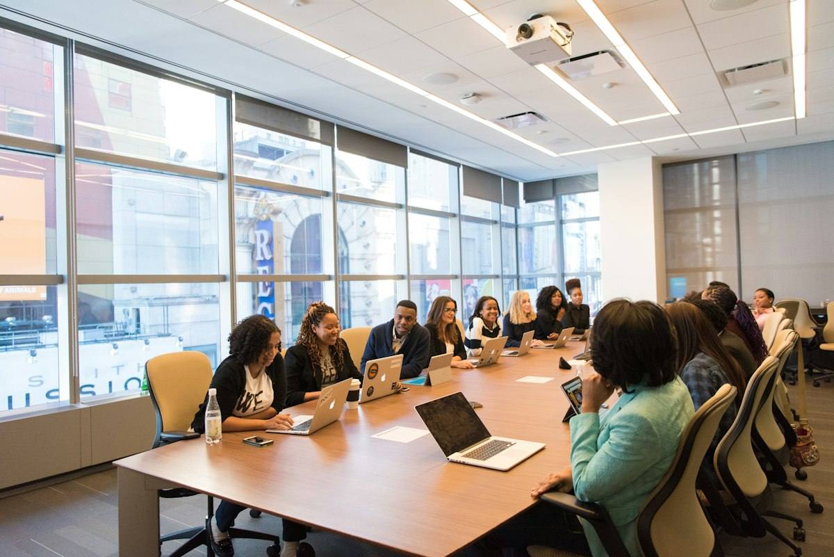 A case agency team working together around a conference table