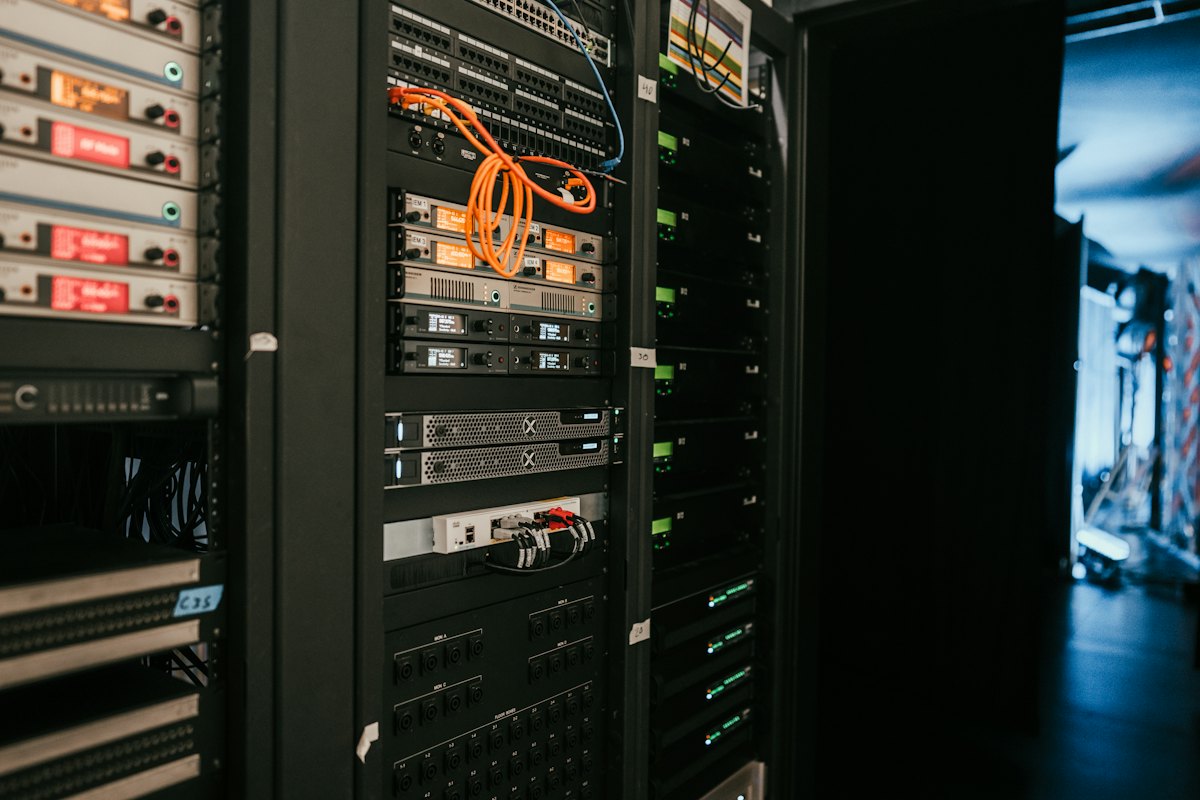 Rows of illuminated data centre servers